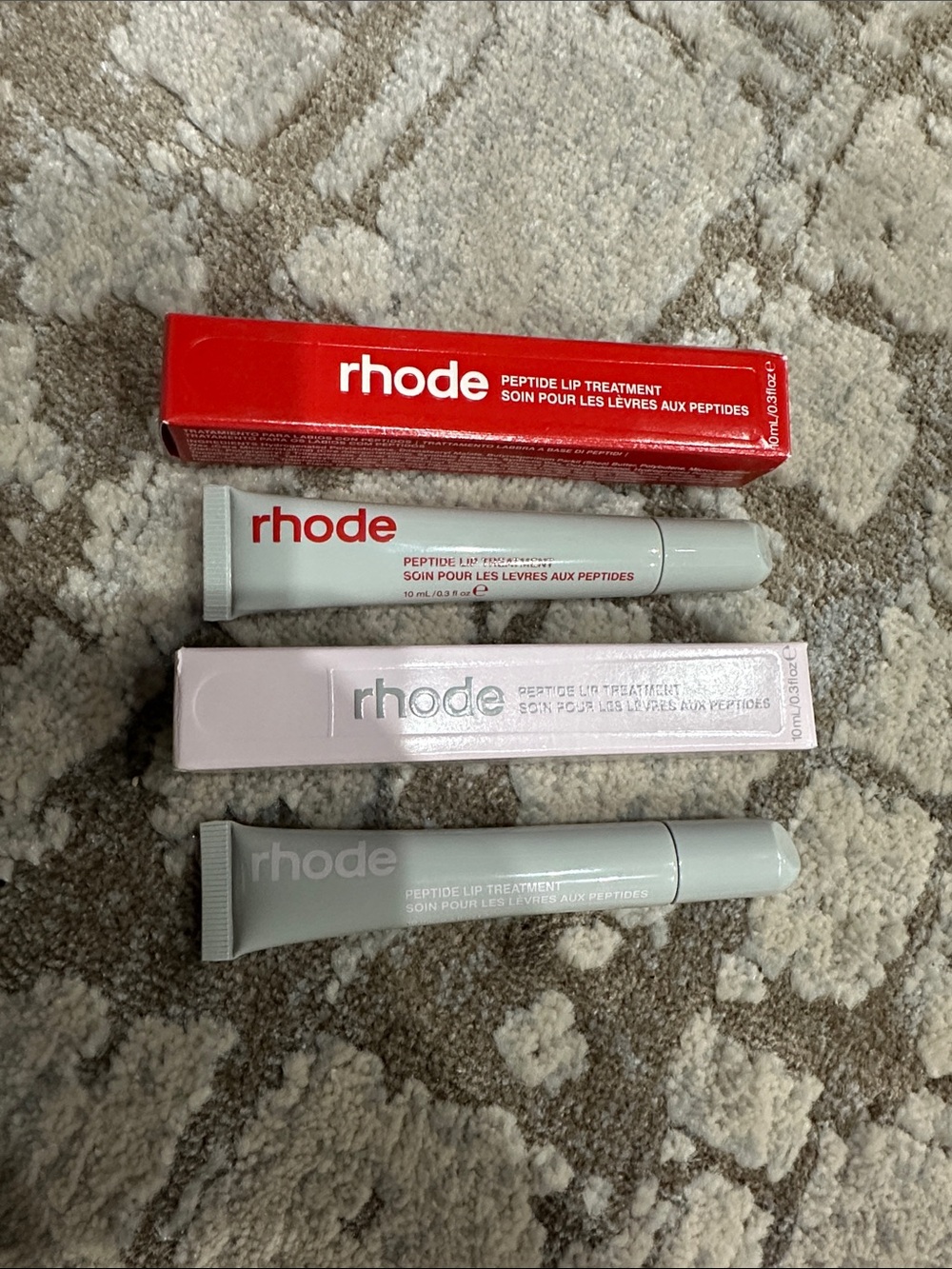 Rhode watermelon and strawberry set peptide lip treatment